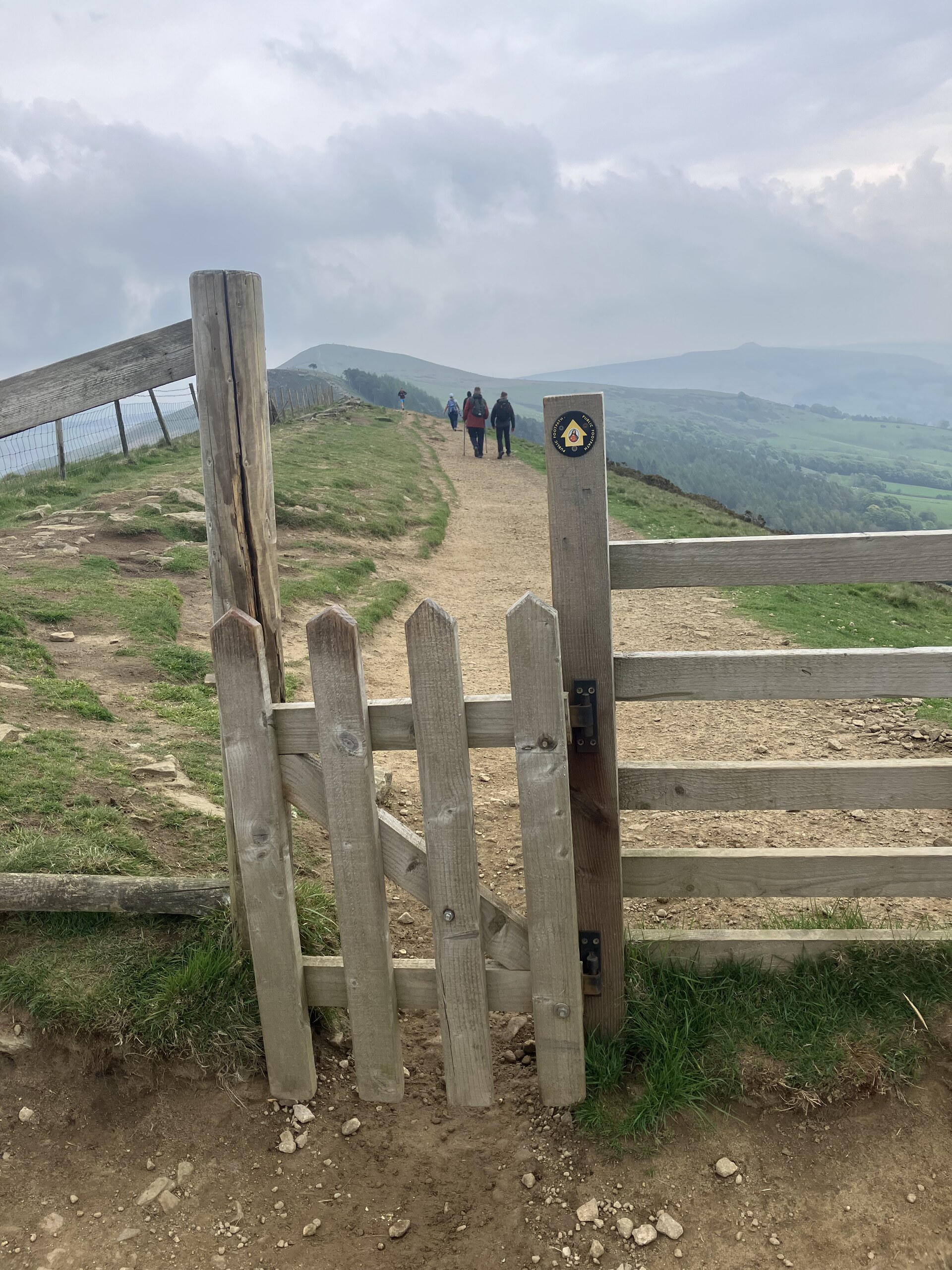 Walkers on the Great Ridge path between Mam Tor and Lose Hill