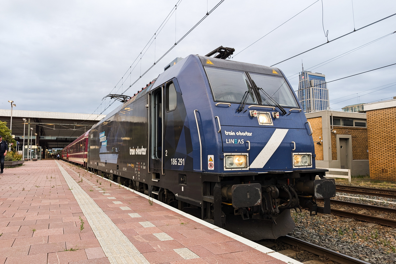 Brussels to Berlin & Prague by Night Train: What It's Really Like European Sleeper train locomotive at a station