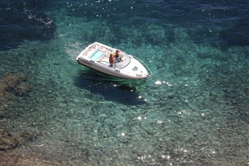 Rent a Boat for the Day: Croatia vs Riviera vs Lake Como Small self-drive boat off the French Riviera coast