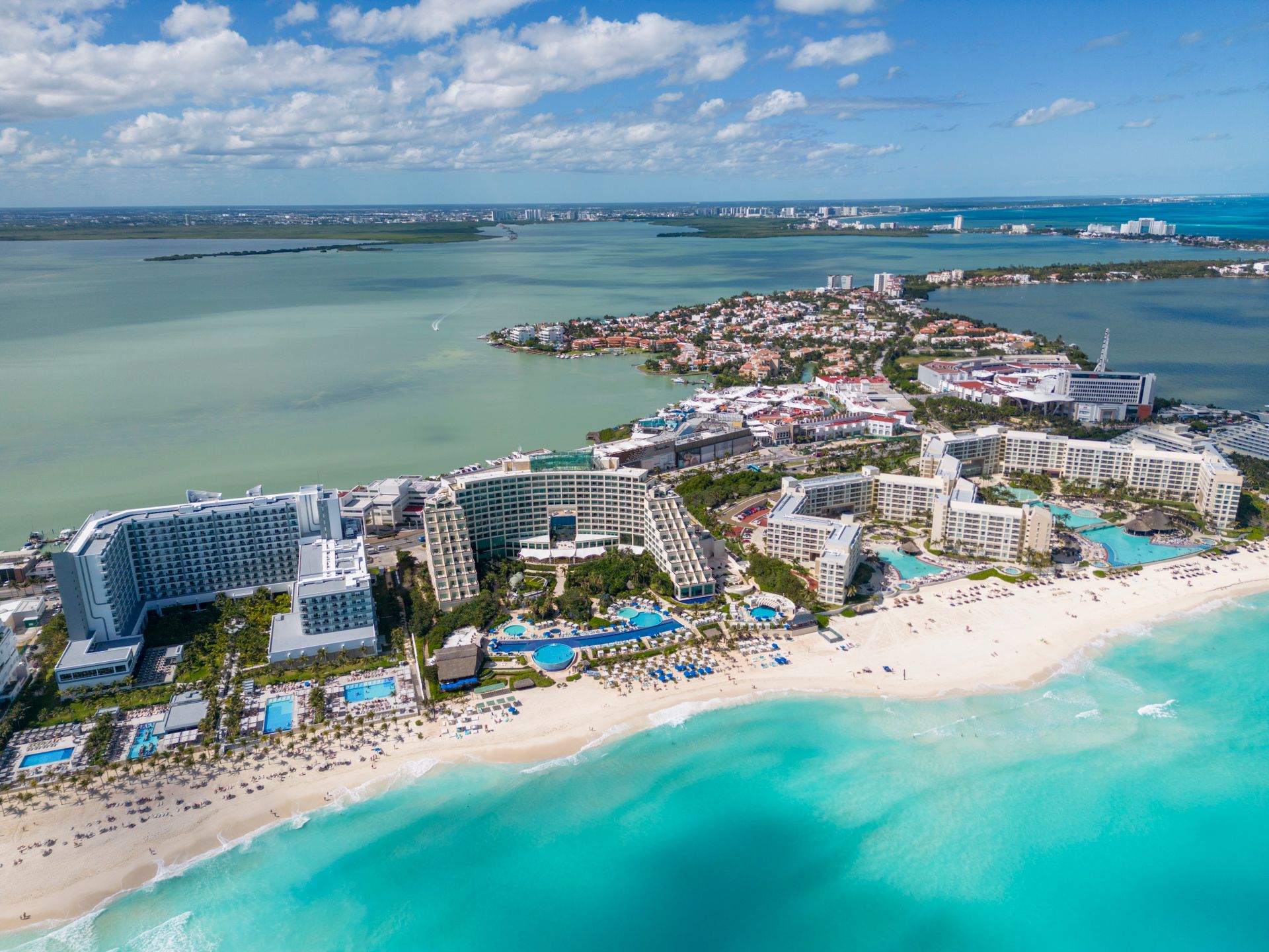 Aerial view of Cancun hotel zone peninsula between sea and lagoon